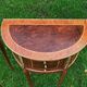 half-moon bedside pair in marquetry, bronze ornaments