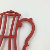 cast iron underside in the shape of a coffee maker