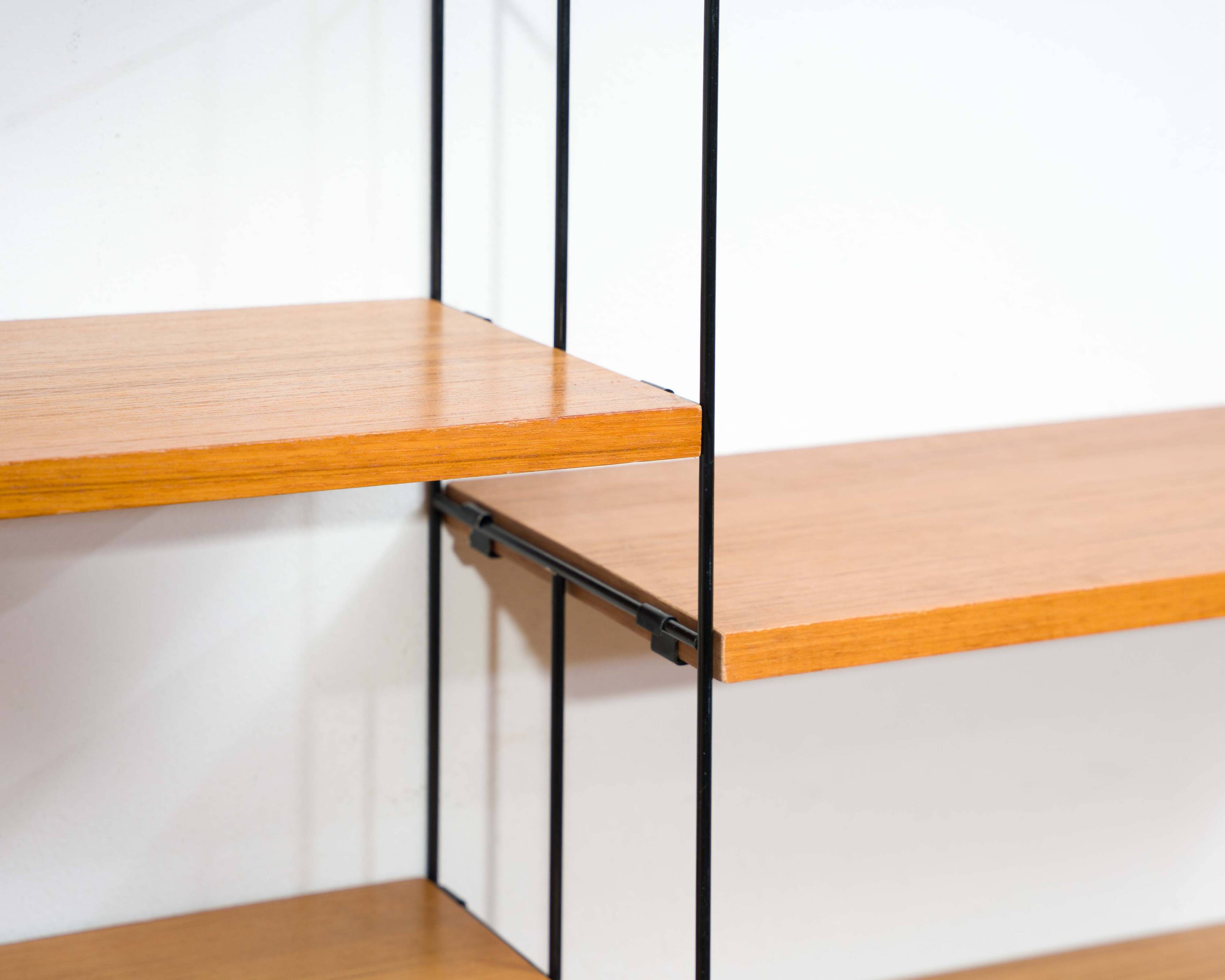 1960s teak wall shelf, manufacturer WHB, eight shelves