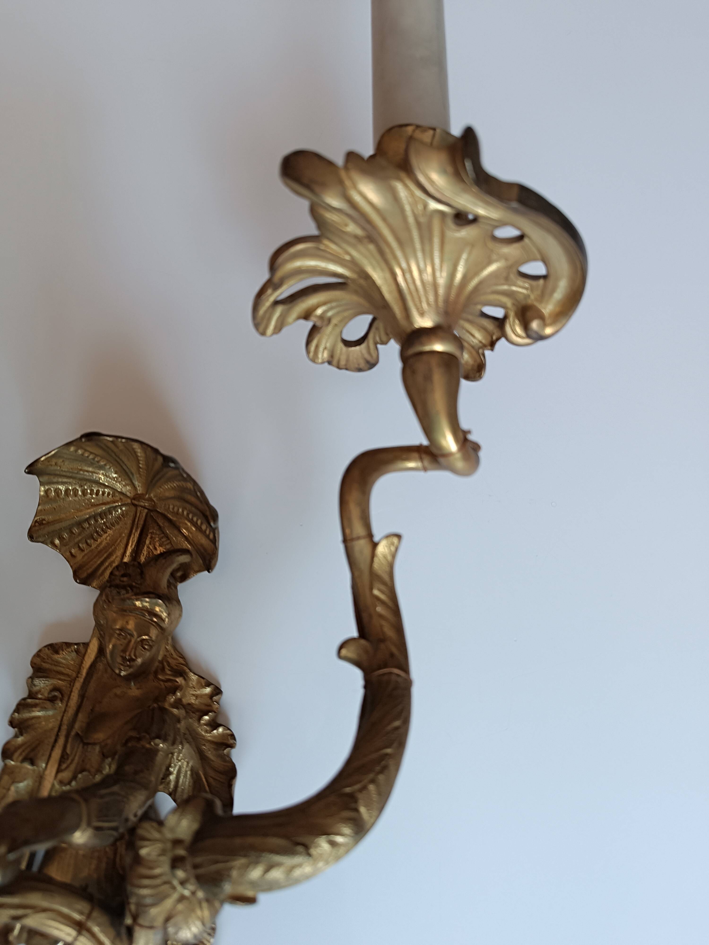 Pair of Regency style gilt bronze wall lights