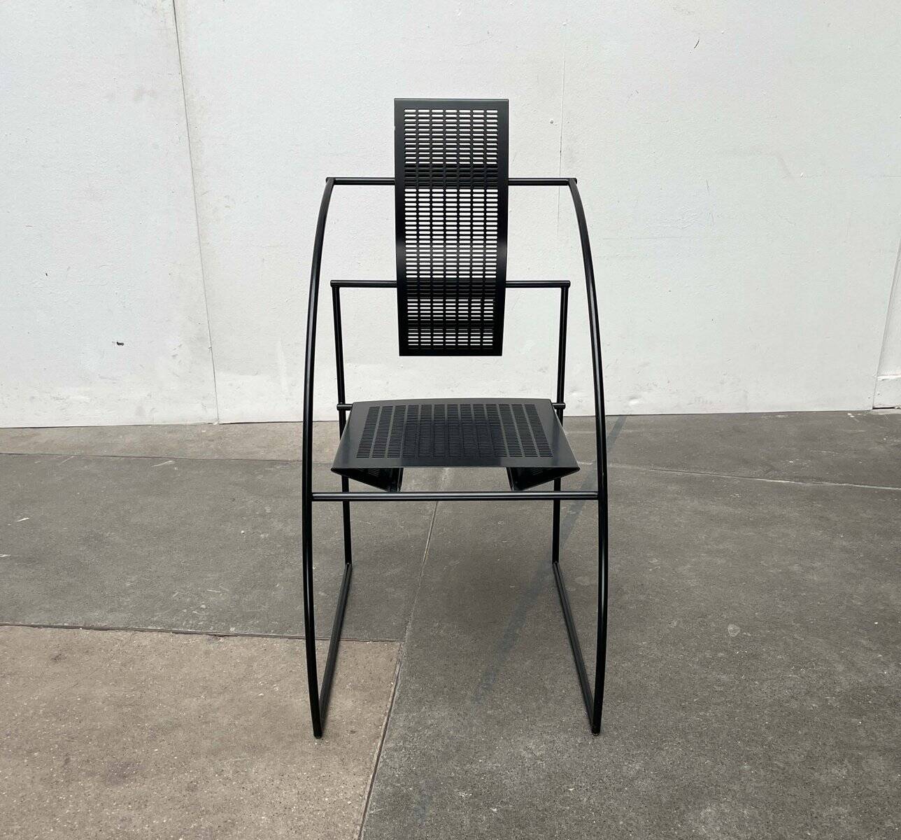 Postmodern black Quinta chair in perforated metal by Mario Botta for Alias, 1980s.