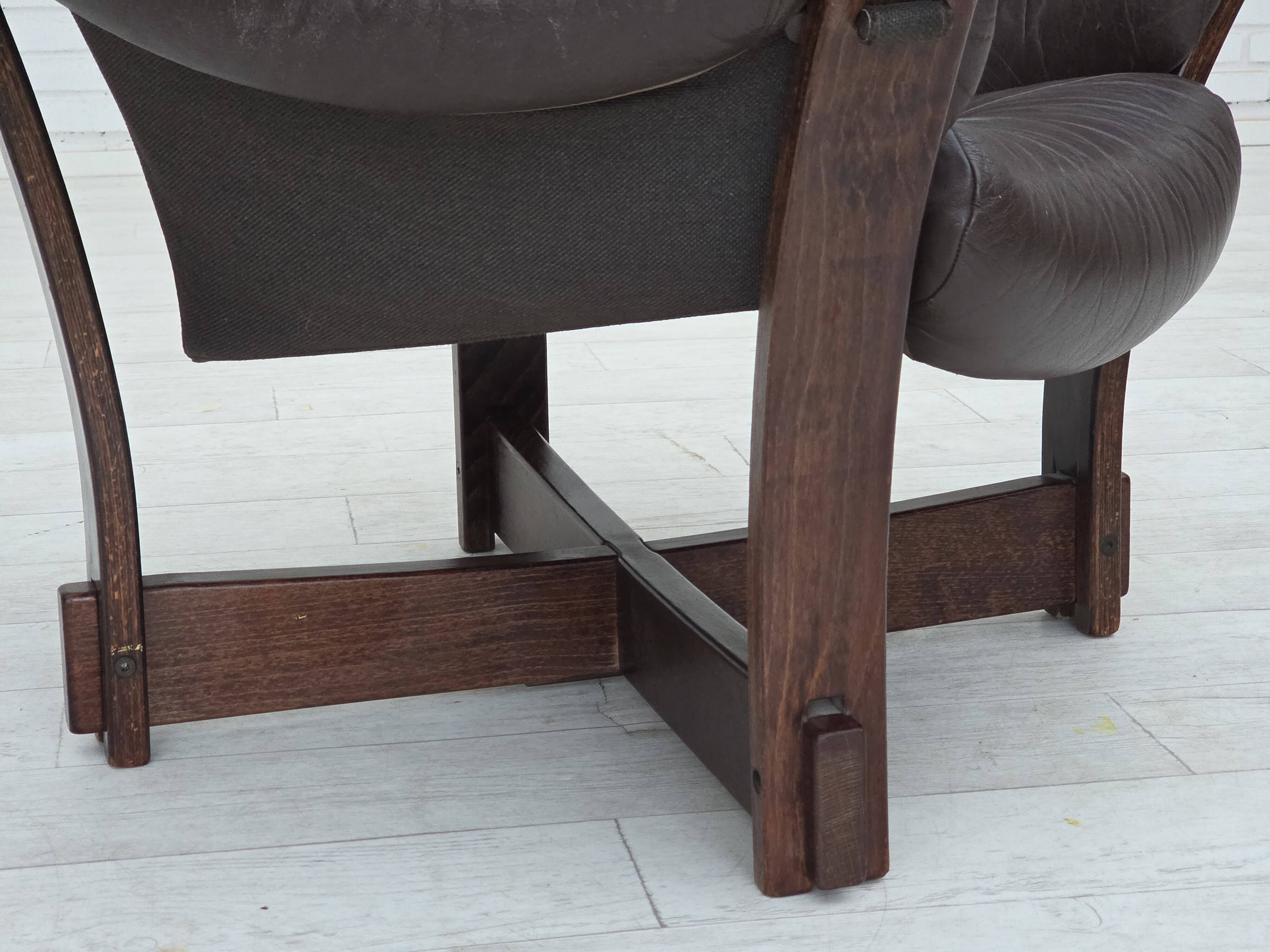 1970s, Scandinavian lounge chair, furniture leather, oak wood.