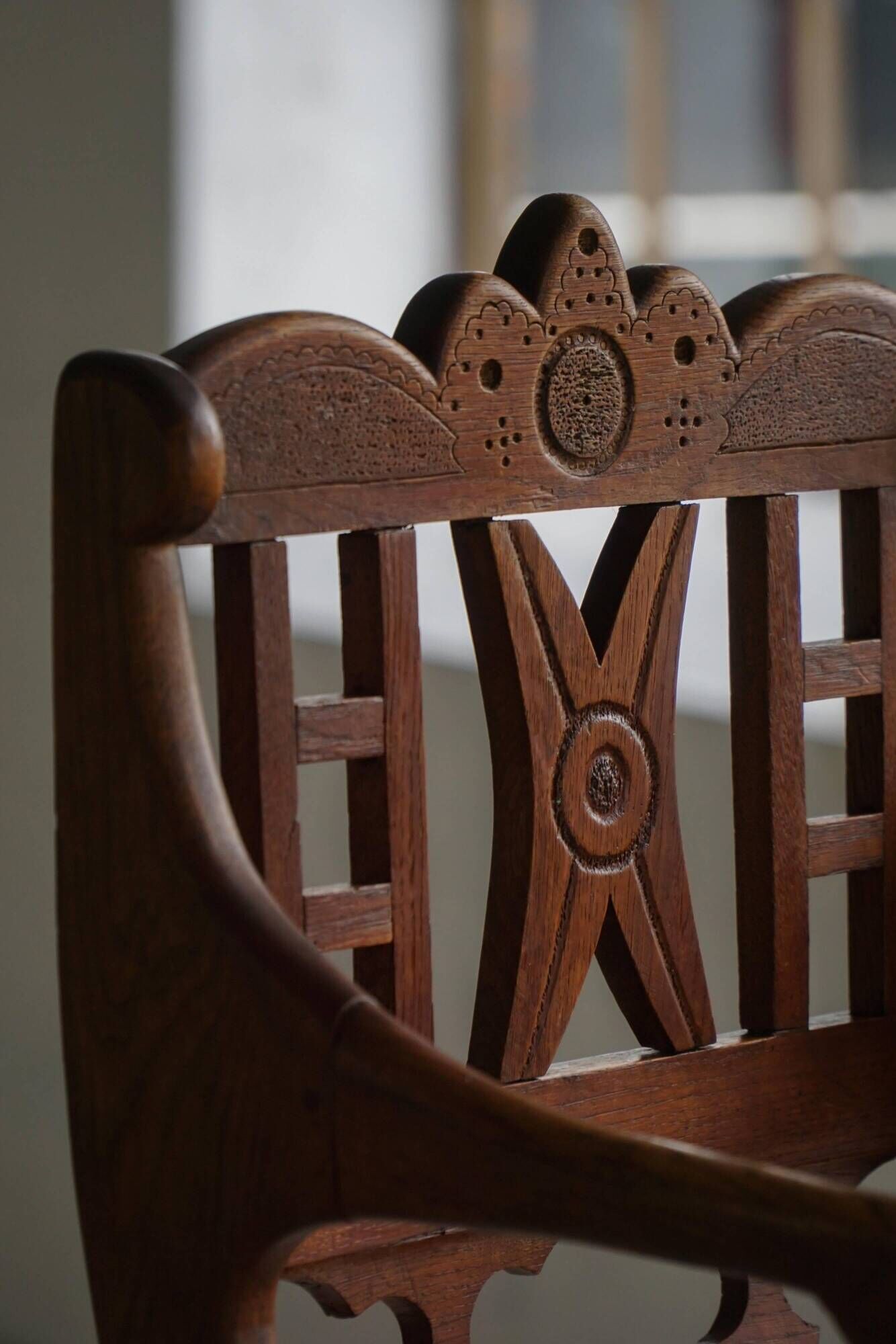 Danish popular art armchair in oak with a lambswool seat, early 20th century, 1930s.