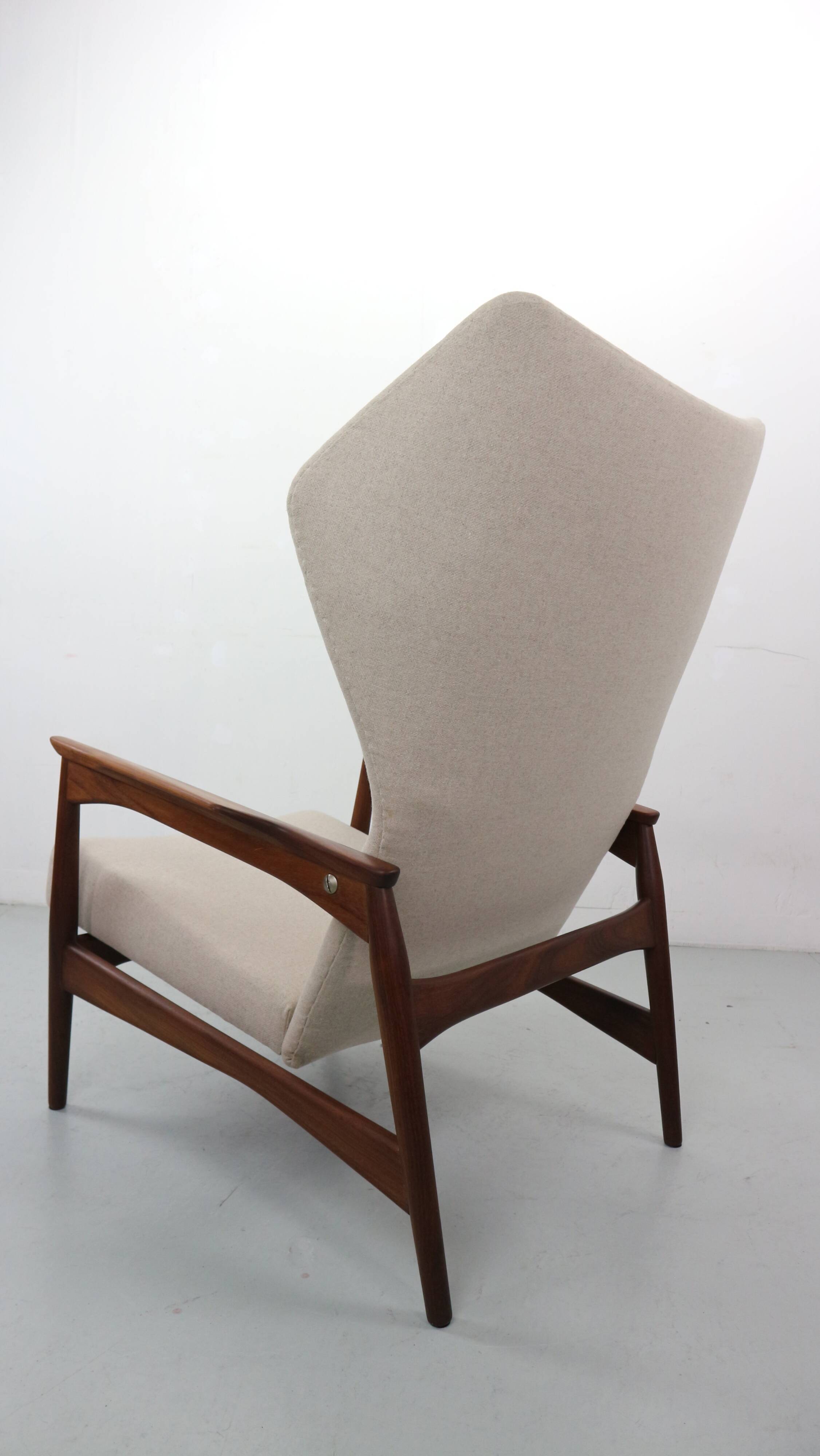 Danish adjustable wingback lounge chair in teak by Ib Kofod Larsen