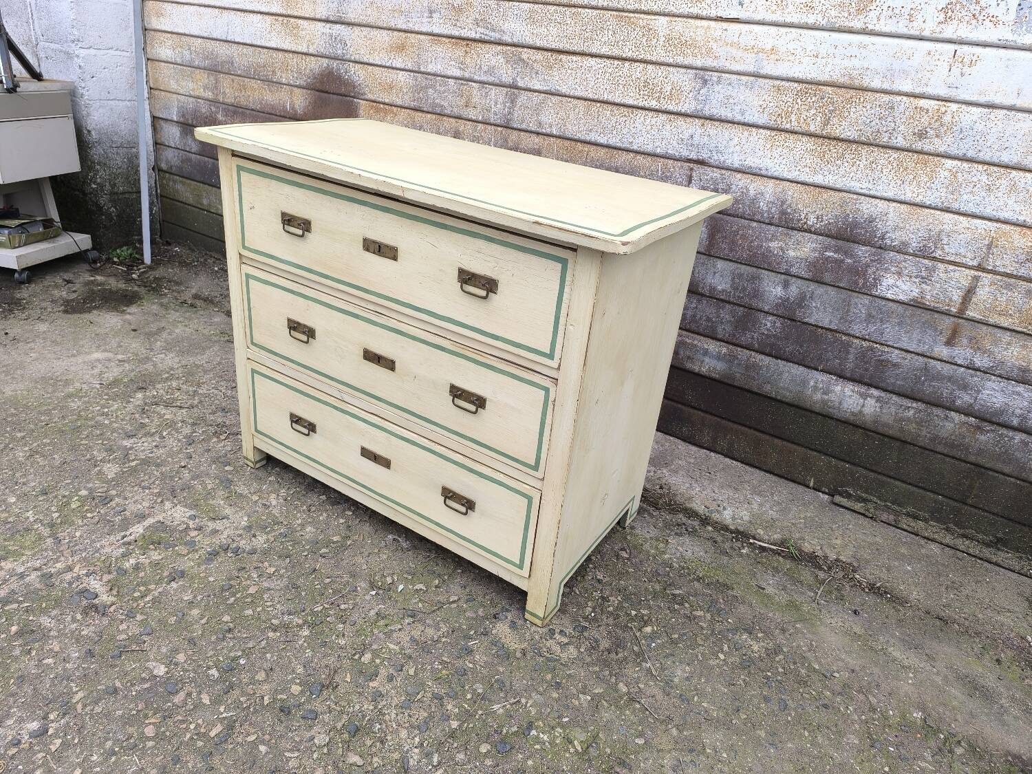 4-drawer chest of drawers with yellow and green patina by a local artist