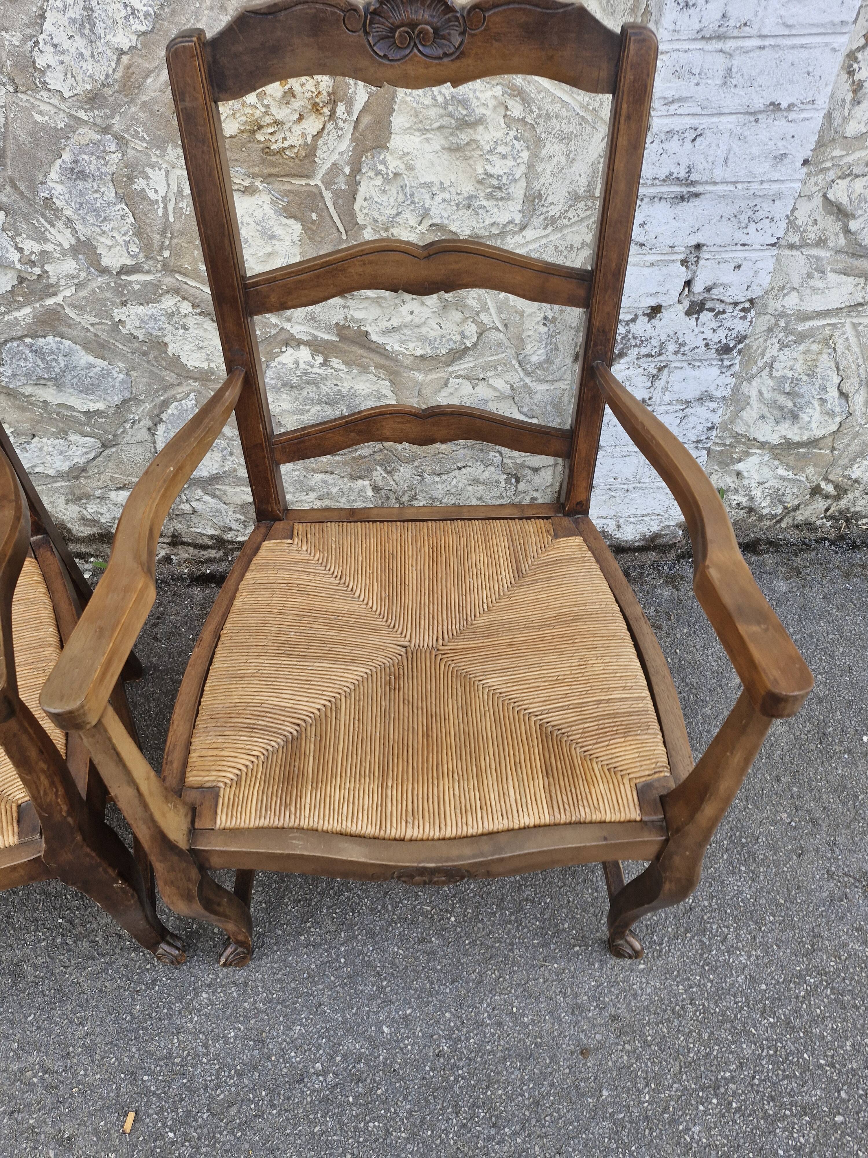 Wood and straw armchairs