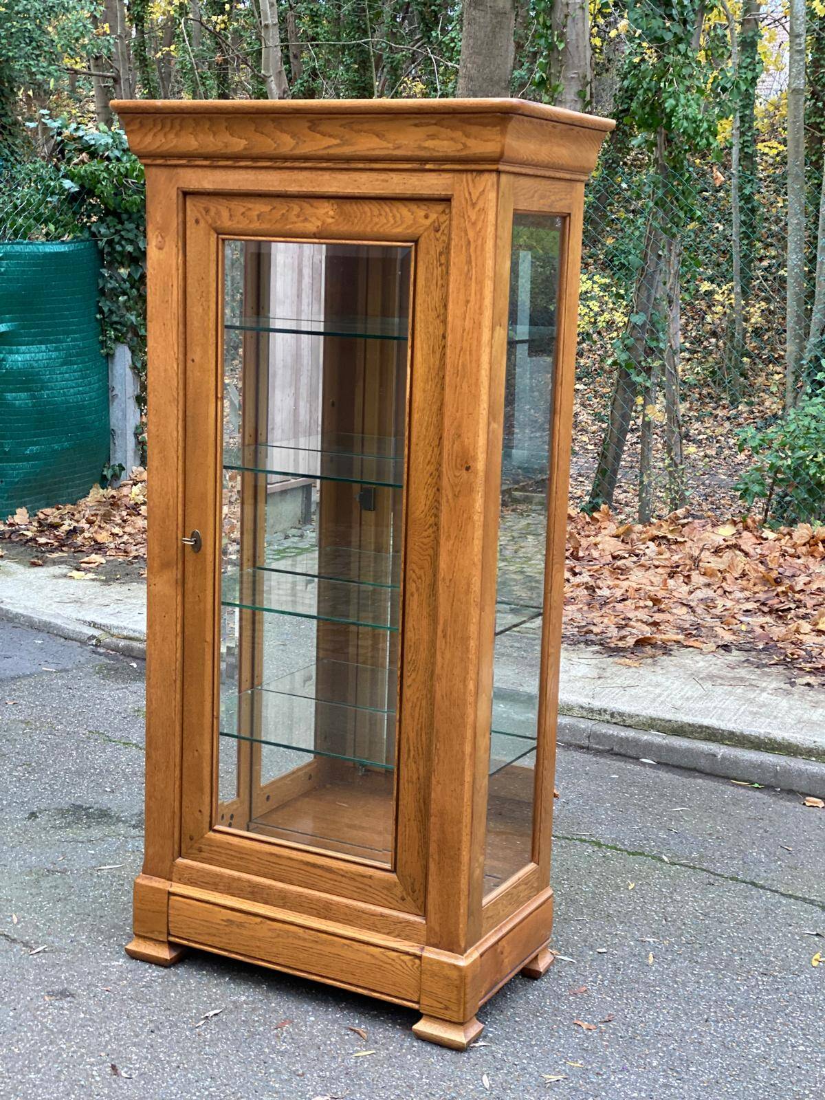 Louis Philippe illuminated display cabinet in solid oak from the 20th century