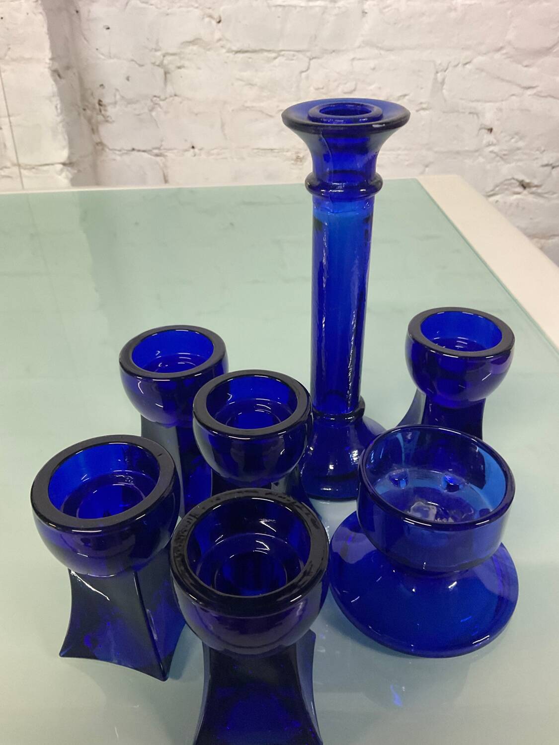 Set of 7 vintage cobalt blue glass footed candlesticks
