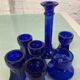 Set of 7 vintage cobalt blue glass footed candlesticks
