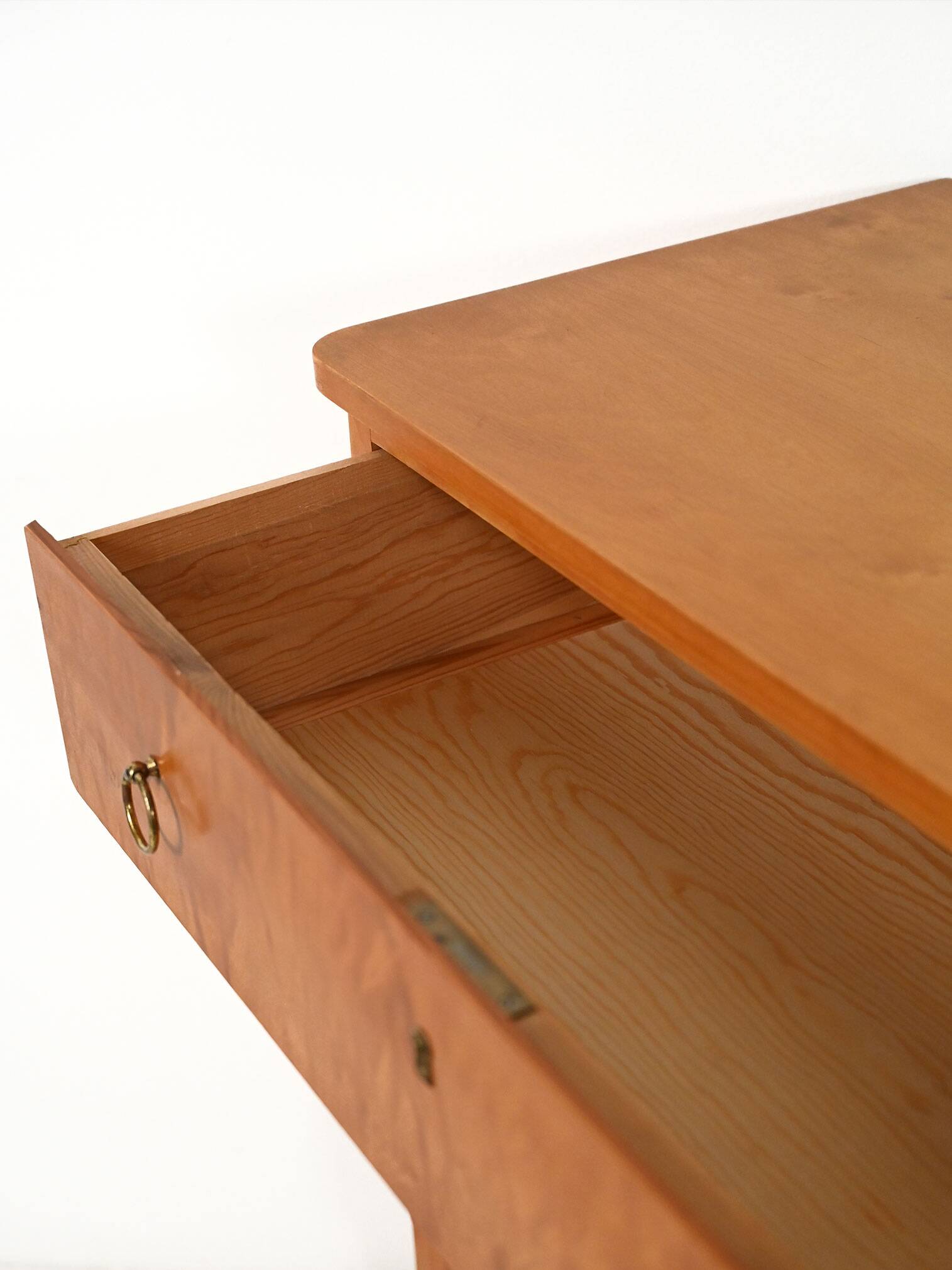 Scandinavian 1950s birch chest of drawers with brass handles