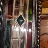 Wrought iron lantern with colored stained glass