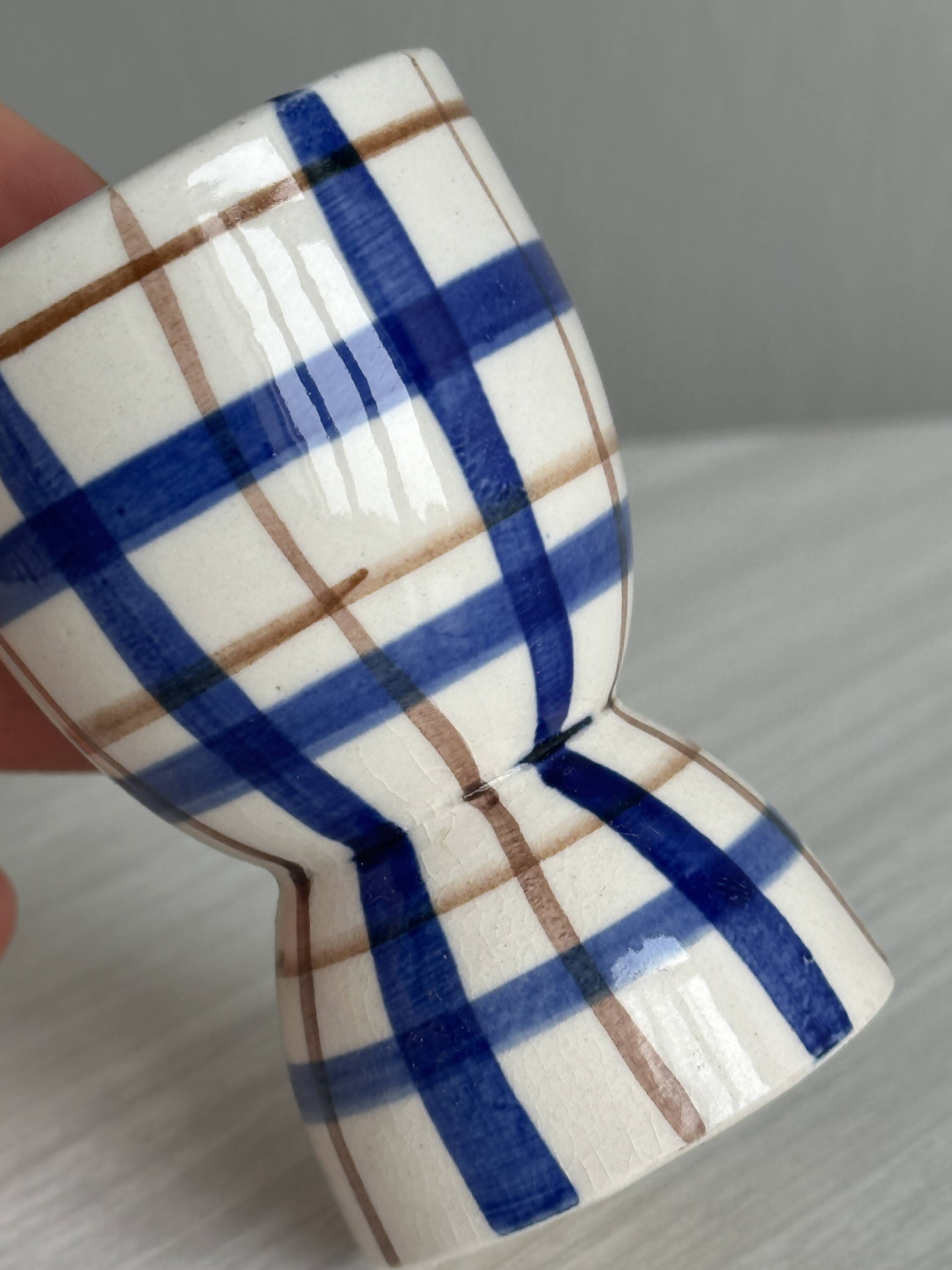 Ceramic egg cup, blue and beige checkered pattern