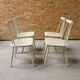 Série de 4 chaises blanches à barreaux 1960