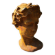 Cast iron sculpture of a woman.