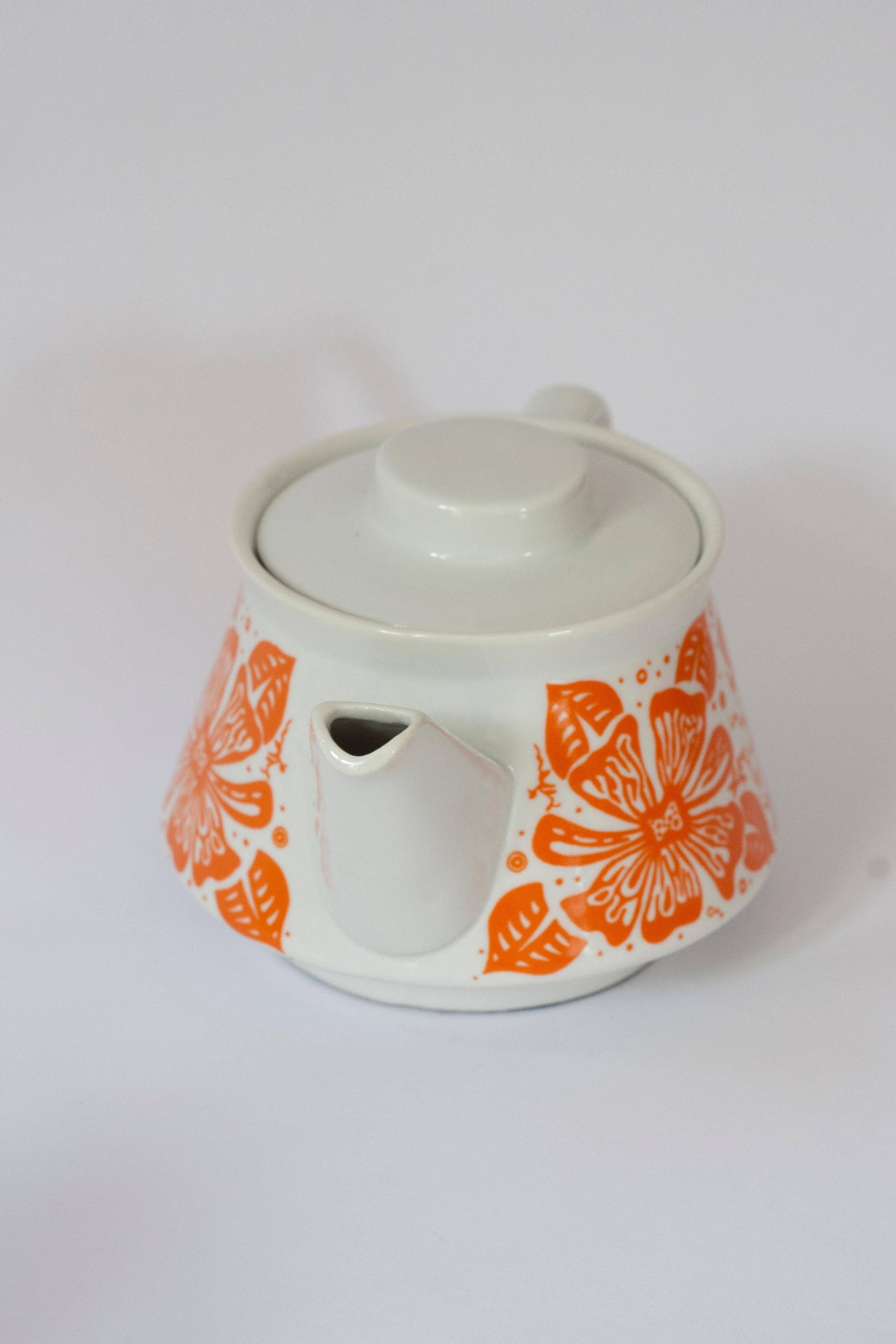 Small white porcelain teapot from the mid-20th century, Europe, 1960s.