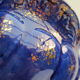 Pair of cache-old pots in midnight blue and gold ceramic