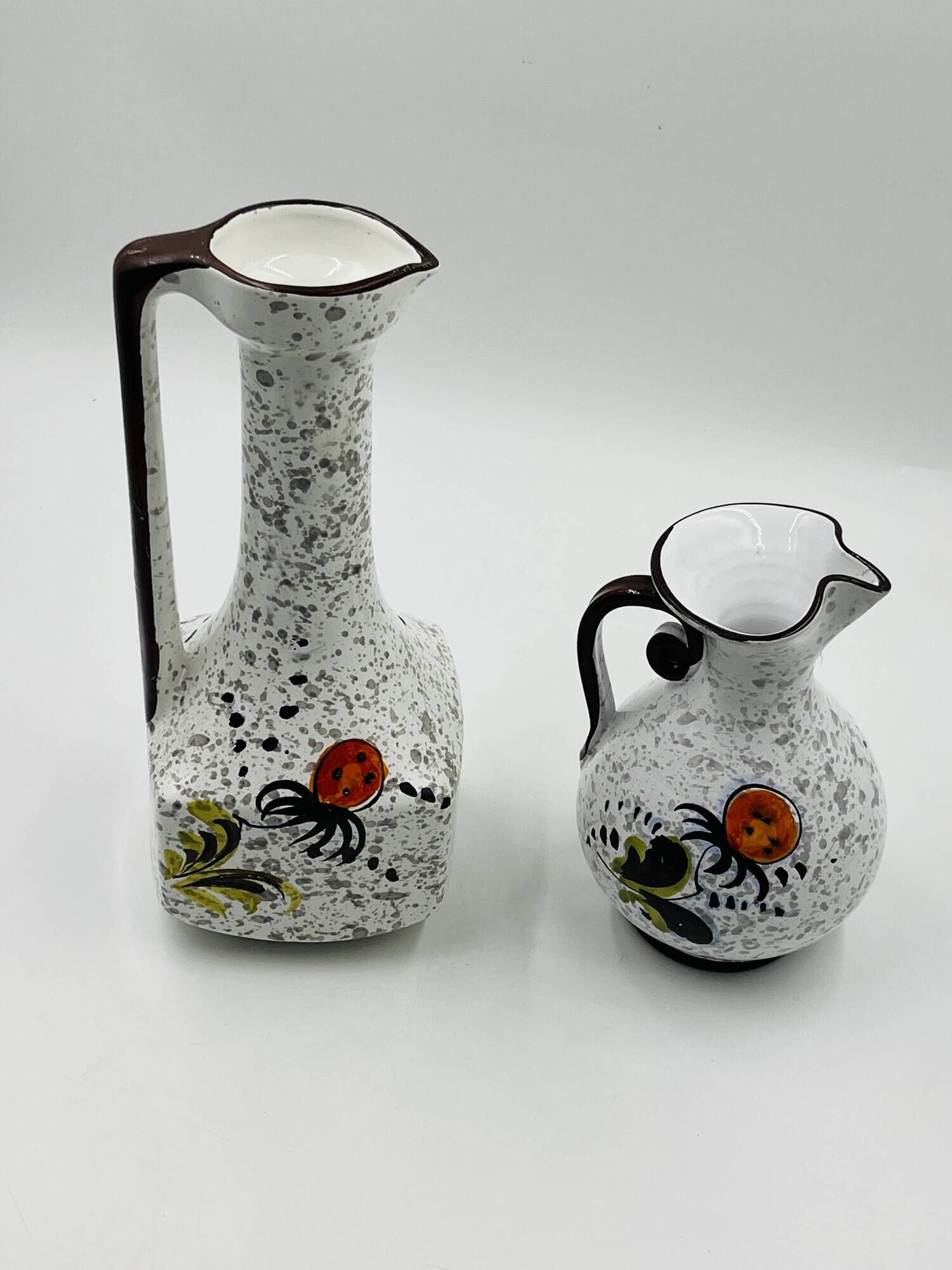 Pair of vintage hand-painted Italian floral vases