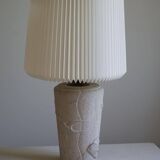 Modern vintage French table lamp, made of stone with fish patterns, 1970s.
