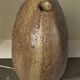 Stoneware single flower vase, signed.