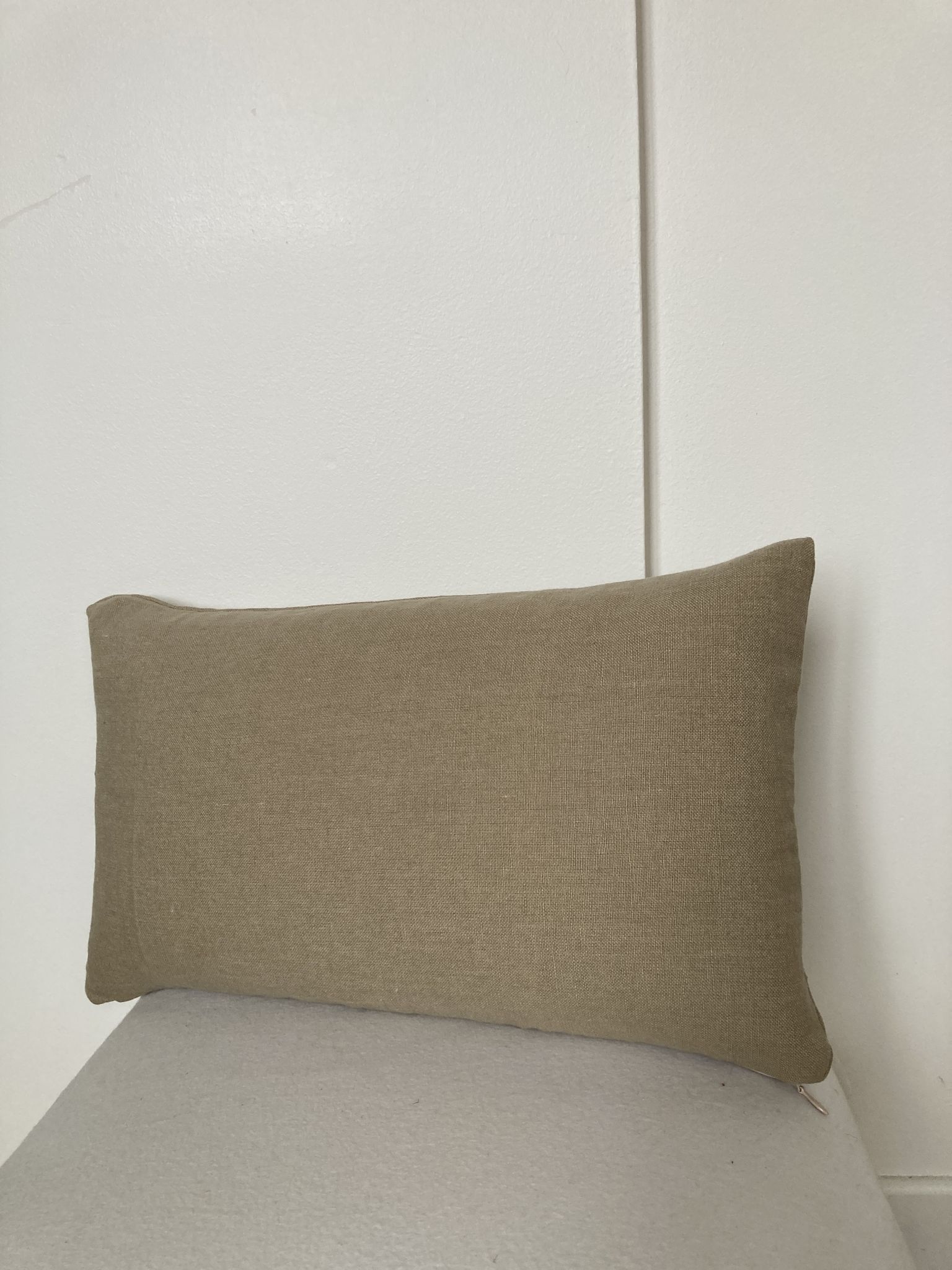 Plain beige linen cushion