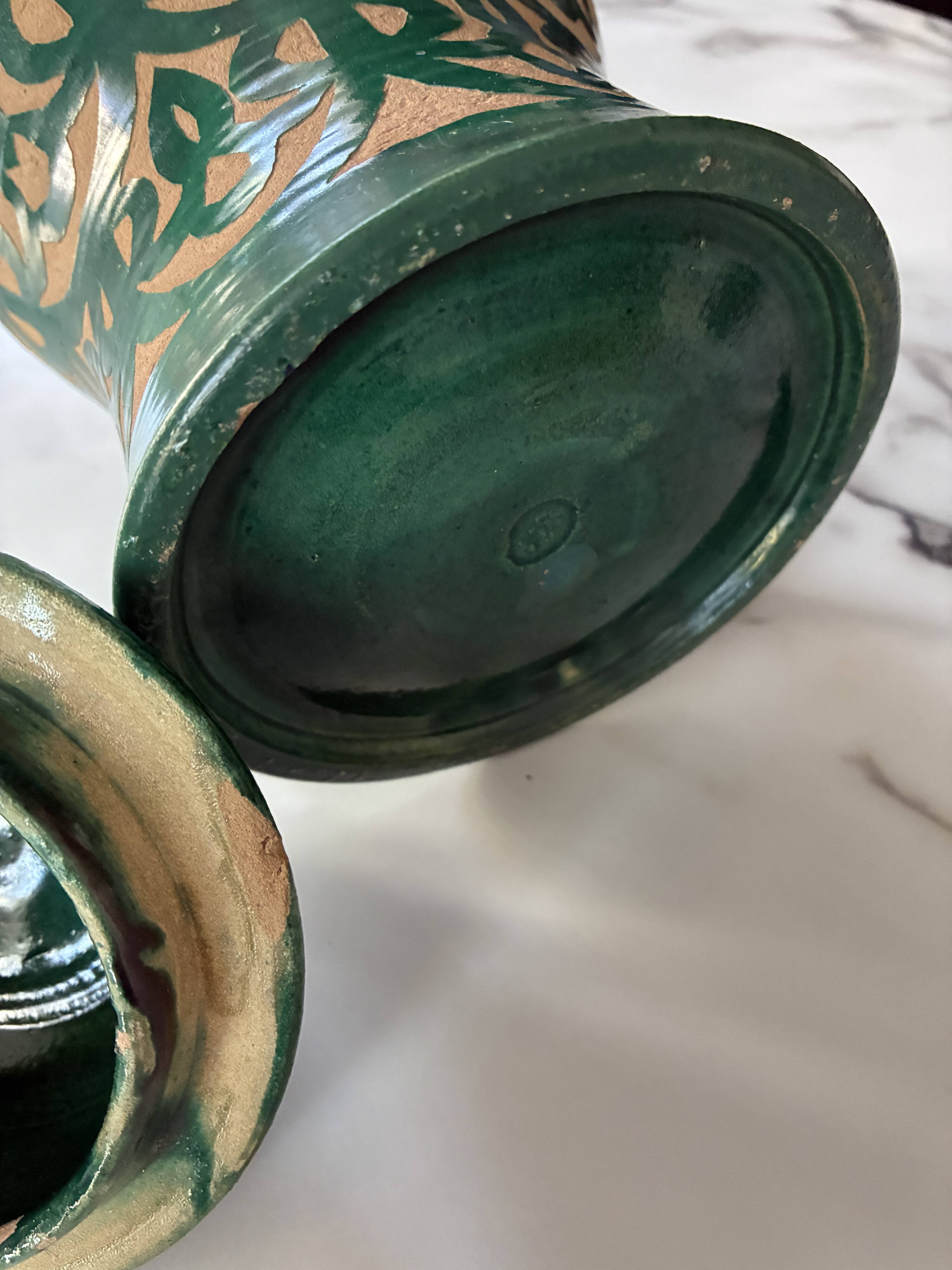 Sculpted terracotta pot