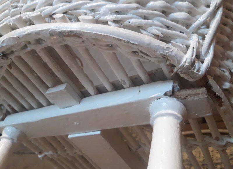 Wicker and painted wood baby cradle