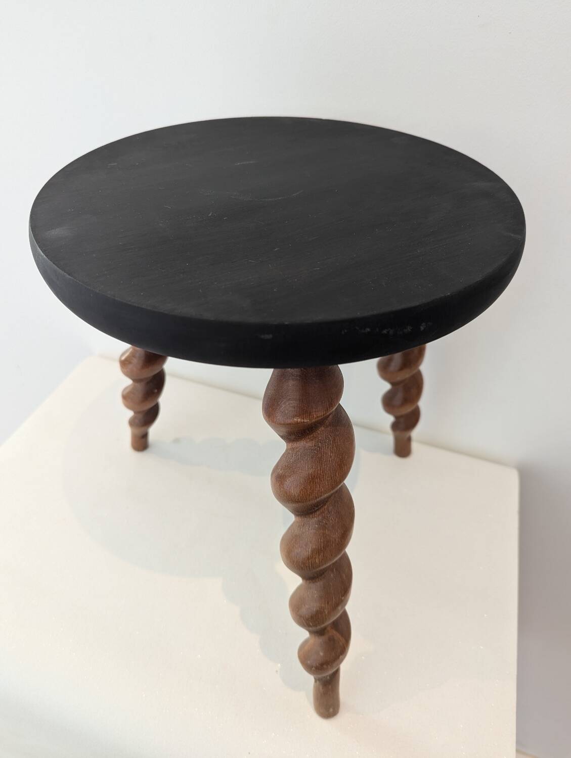 Wooden tripod stool