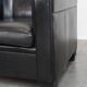 Very comfortable black Art Deco design armchair, made of sheepskin leather