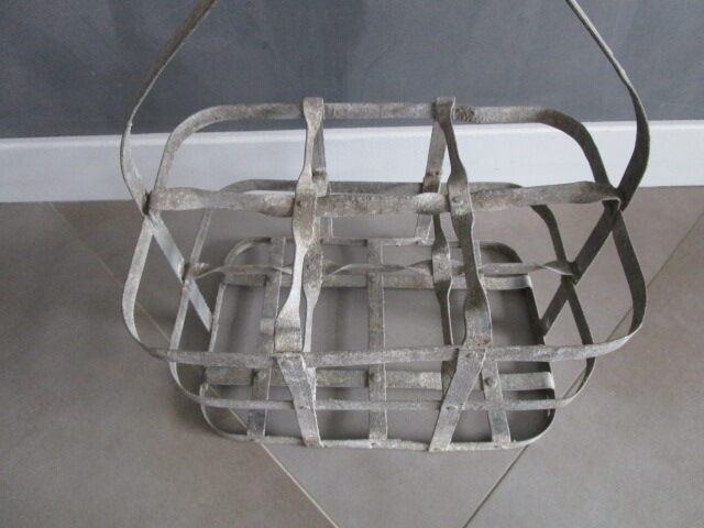 Antique metal bottle holder