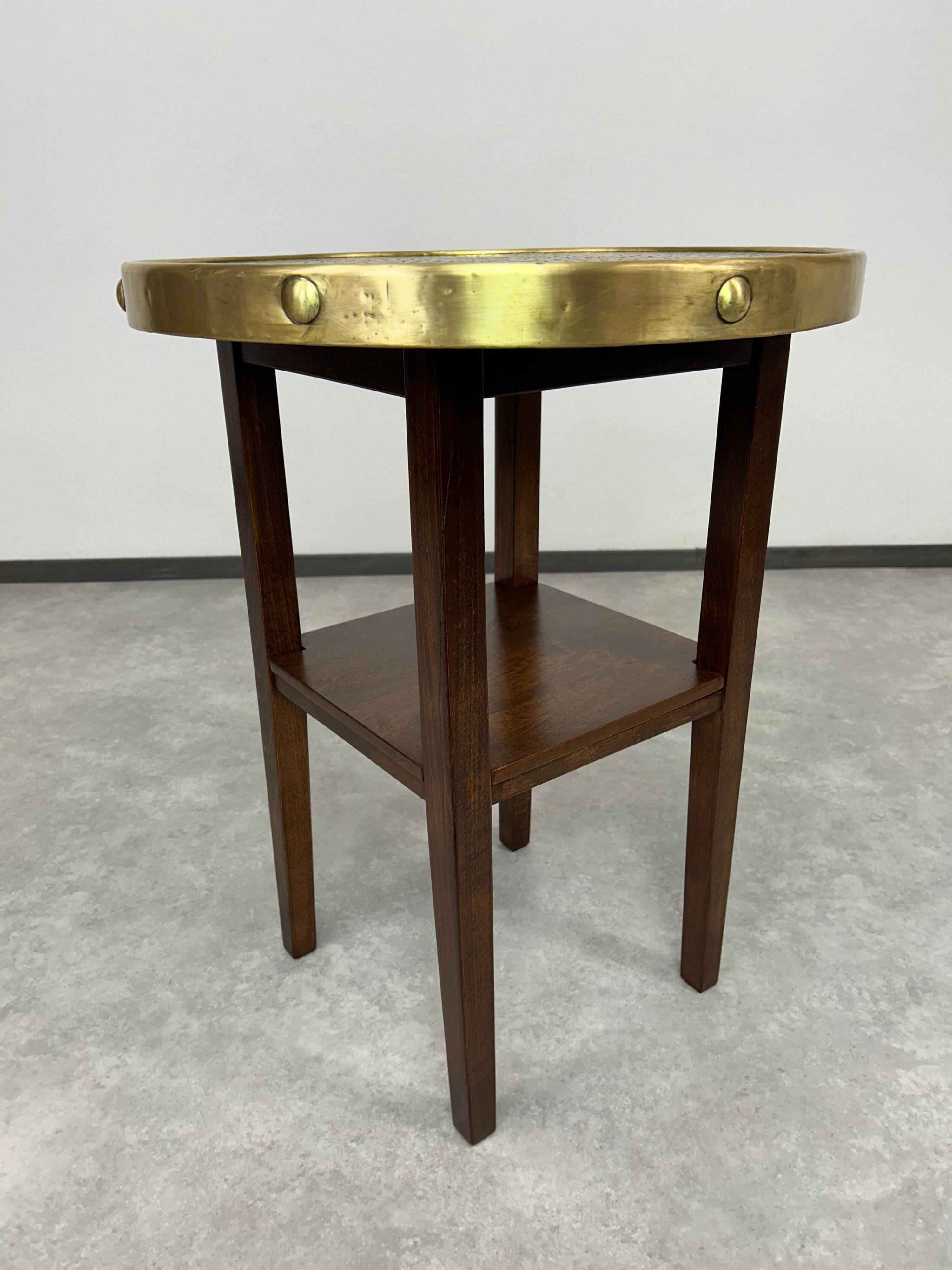 Secession coffee table with a brass top