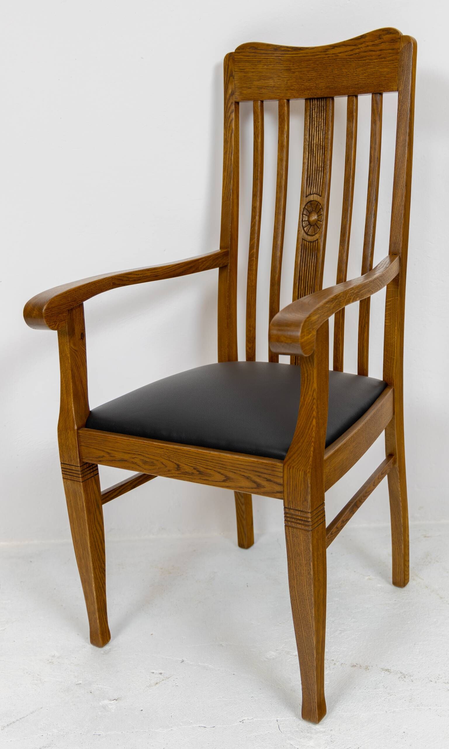 Set of 6 Art Nouveau chairs and armchairs in oak and leather.