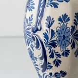 Pair of Royal Delft blue and white ceramic table lamps, 1905, with new pleated silk shades.