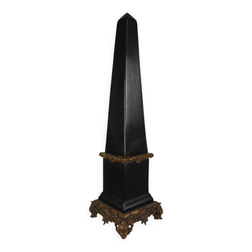 Black porcelain obelisk with bronze ornaments