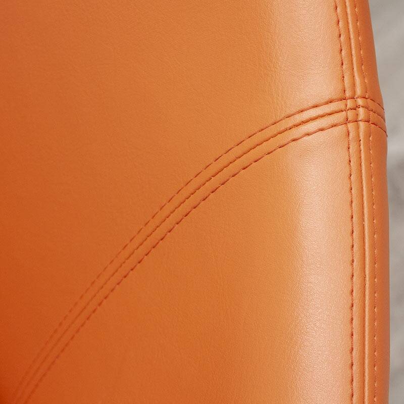 Open armchair in orange leather by Allermuir