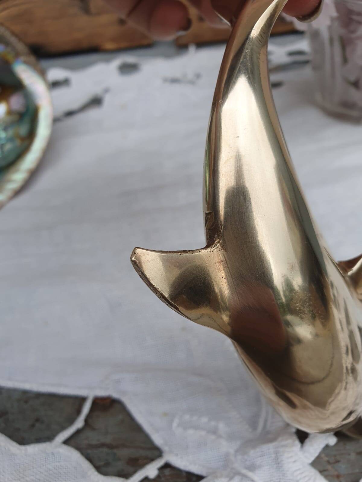 brass dolphin