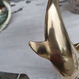 brass dolphin