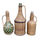 Glass bottles and rattan, woven wicker