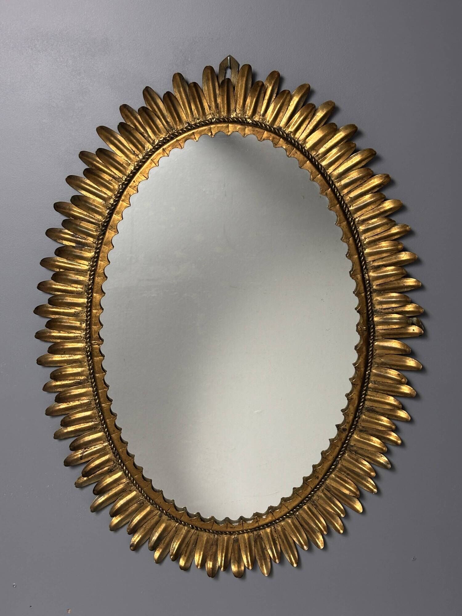 Midcentury bohemian Hollywood Regency Spanish gilt metal sun mirror, 1960s