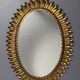 Midcentury bohemian Hollywood Regency Spanish gilt metal sun mirror, 1960s