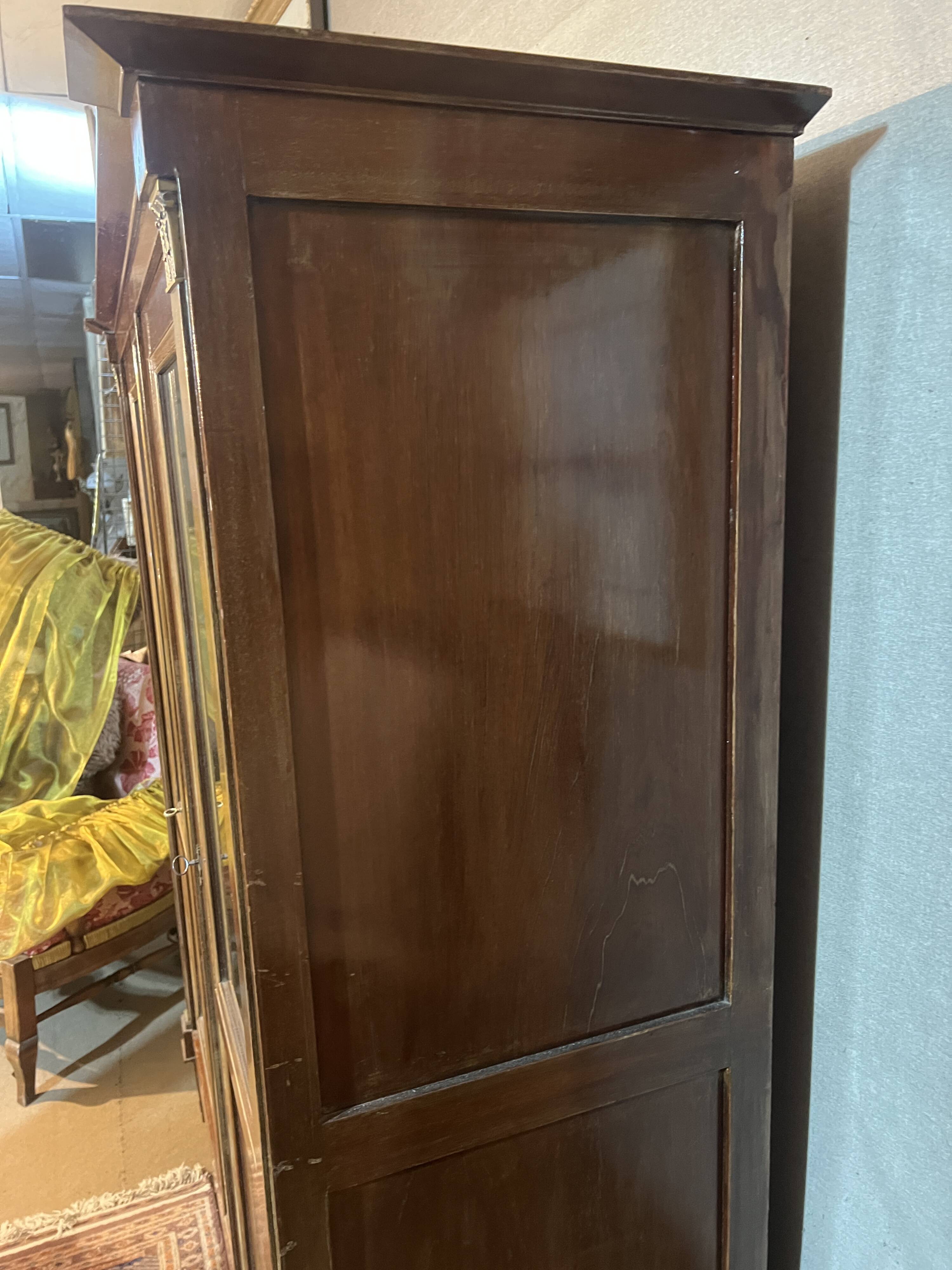 Directoire style library with two mahogany doors