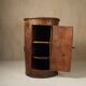 Primitive folk art cabinet made of an old tree trunk.