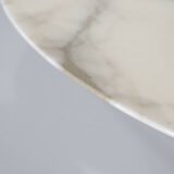 Tulip dining table in marble by Eero Saarinen for Knoll International.