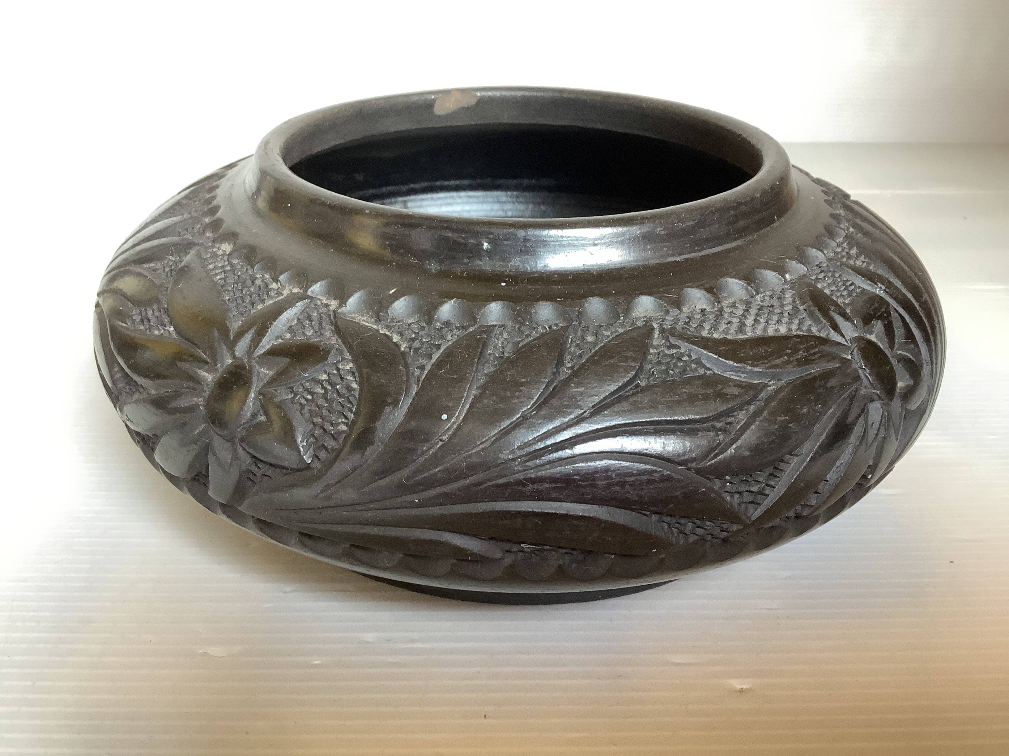 Black pottery catchall worked from Marginea, Romania.