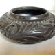 Black pottery catchall worked from Marginea, Romania.