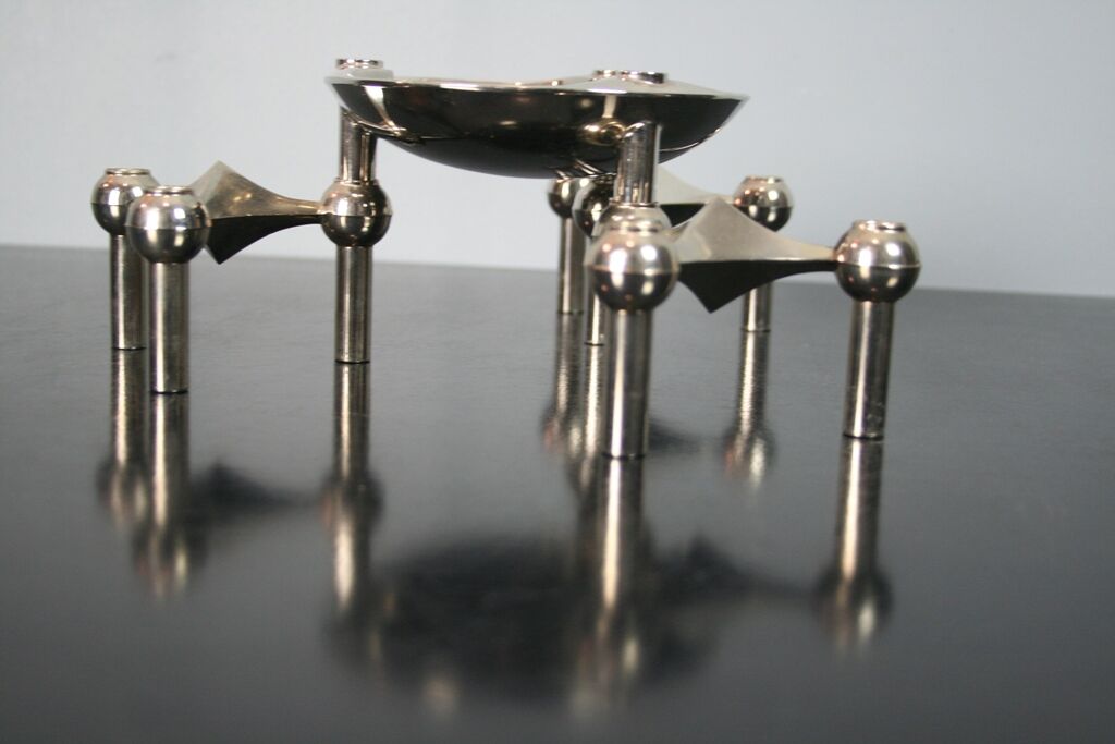 3 candle holders and 1 modular cup NAGEL 1970