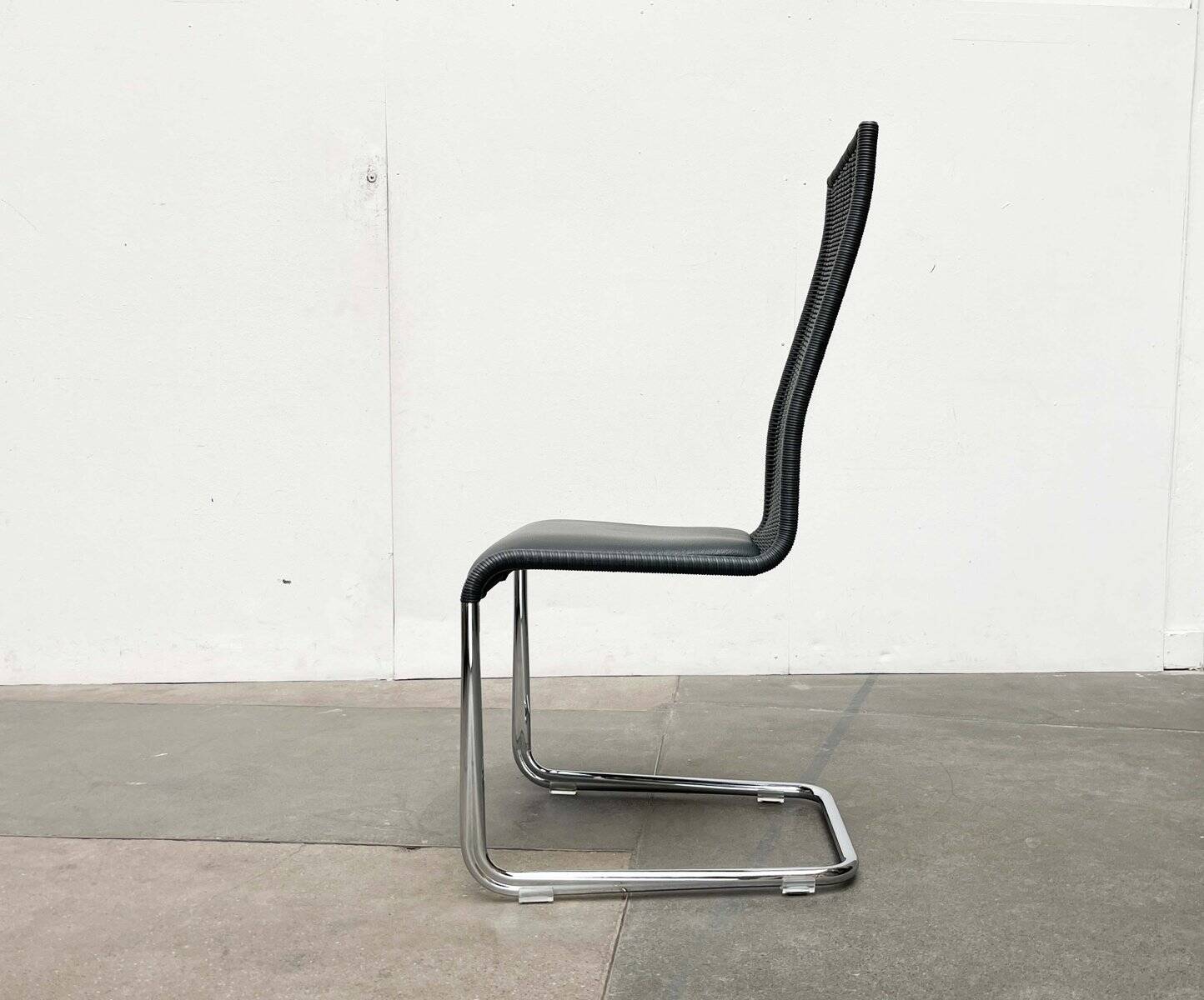 German B25 cantilever chairs in grey with fixed leather cushions by Tecta and Jean Prouvé, set of 2.