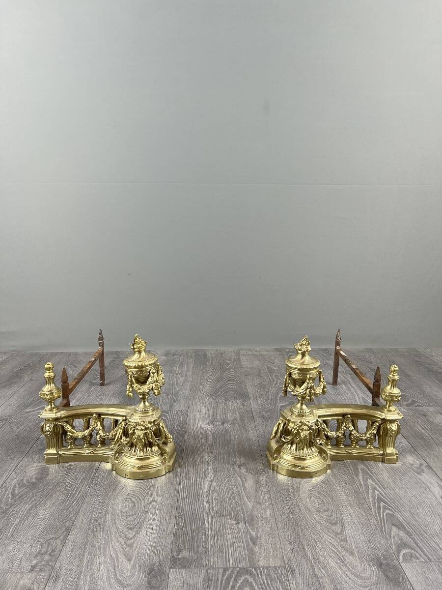 Pair of gilded bronze andirons, Louis XVI style, 20th century