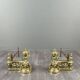 Pair of gilded bronze andirons, Louis XVI style, 20th century