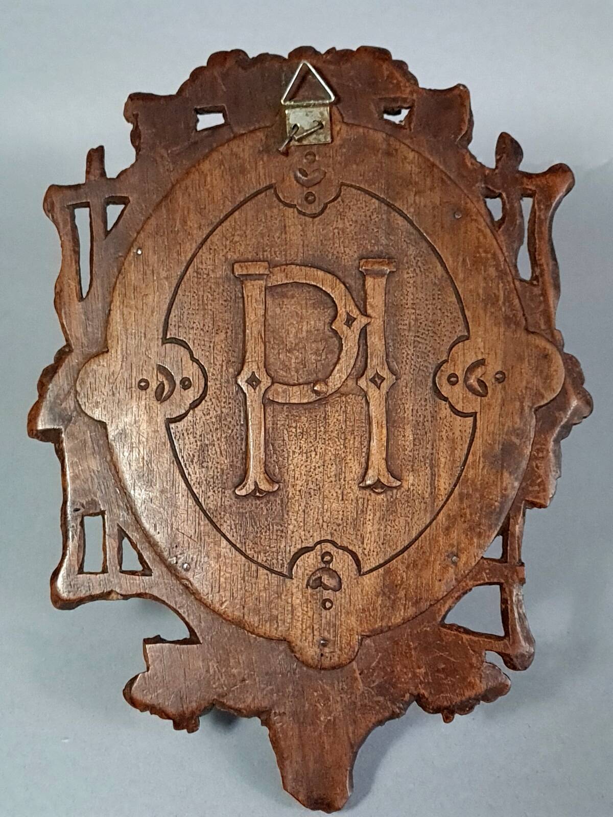 Antique small beveled mirror with carved wooden frame and waxed patina C714
