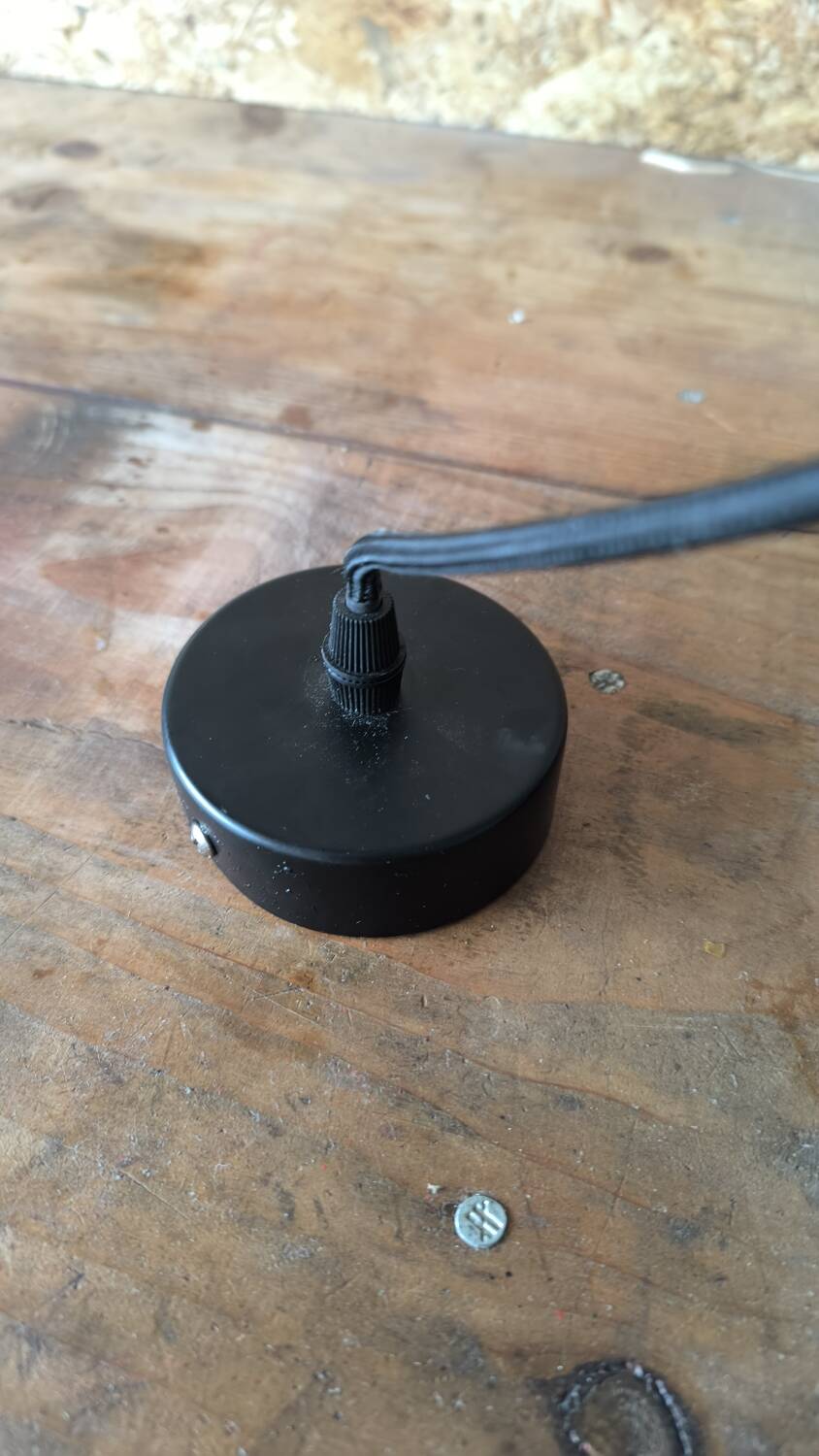 Perforated lacquered sheet metal suspension from the 90s